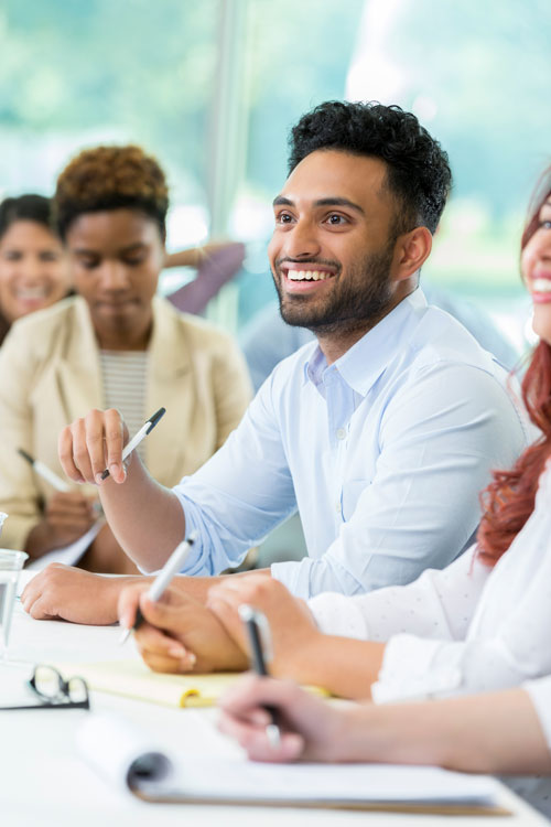 indian professional man at a group training